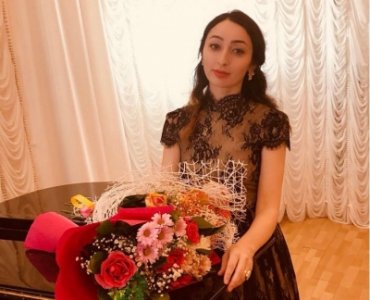 Поздравляем Р.Д. Экажеву с почетным званием "Заслуженный работник культуры РИ"